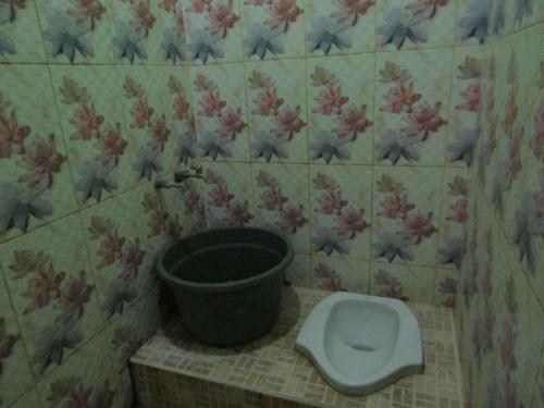 Ванна кімната в Hotel Nirmala