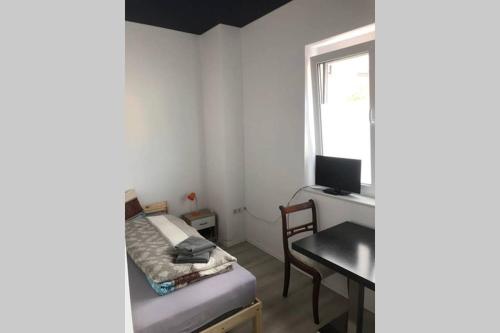 Postel nebo postele na pokoji v ubytování Zimmer 2