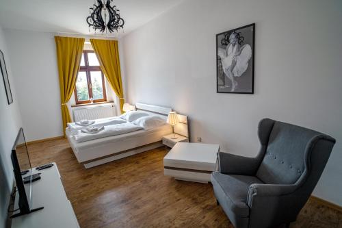 A seating area at Apartmany Pisek