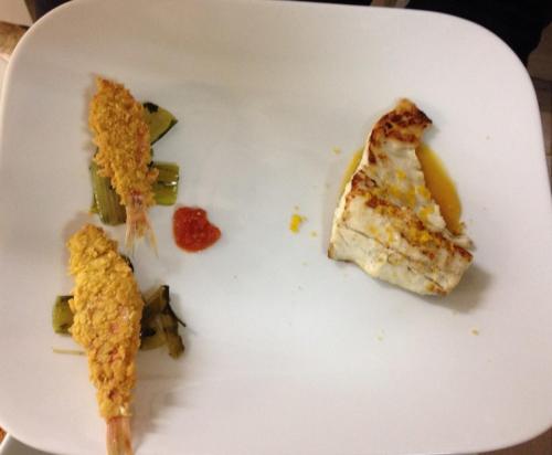 a piece of food on a white plate at Ristorante Hotel Lucia - 100 mt dal mare in Giulianova