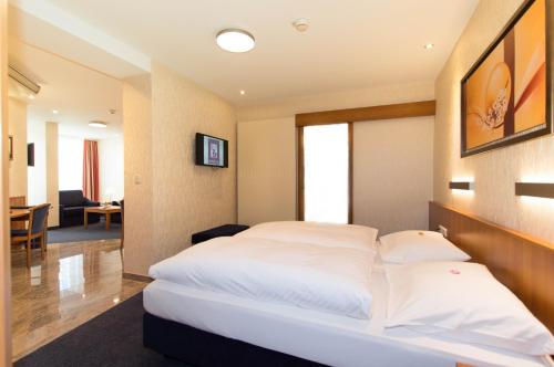 Katil atau katil-katil dalam bilik di Hotel Boehler