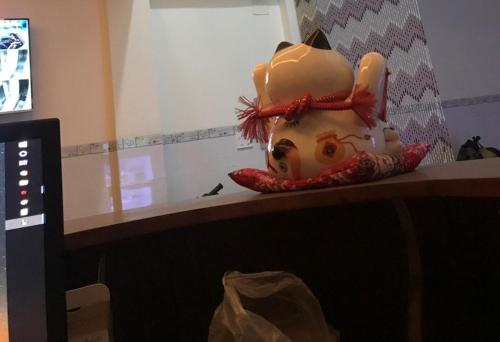 a toy fish is sitting on a counter at Dung Khanh Motel in Dĩ An