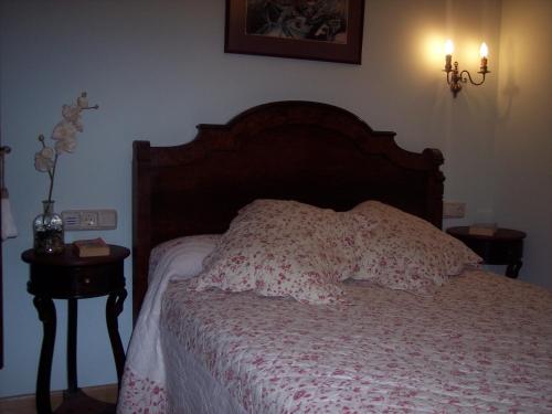 Postel nebo postele na pokoji v ubytování Hotel Azkue
