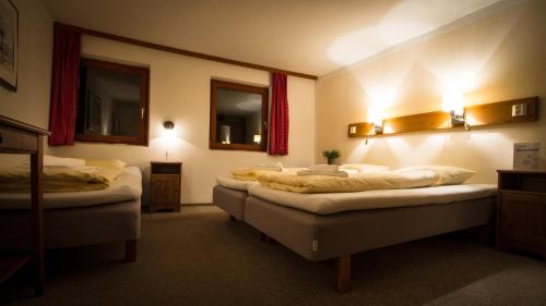 Postel nebo postele na pokoji v ubytování Haus Innerwald by Châtel Reizen