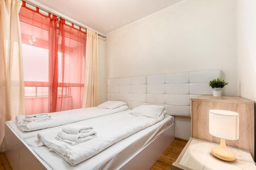 Posteľ alebo postele v izbe v ubytovaní Al Krakowska 291A by Homeprime