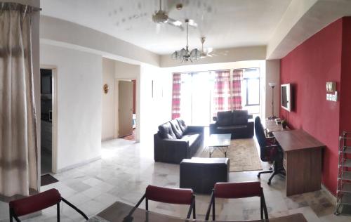 Zona d'estar a Villa Putra PWTC R3 Single Room