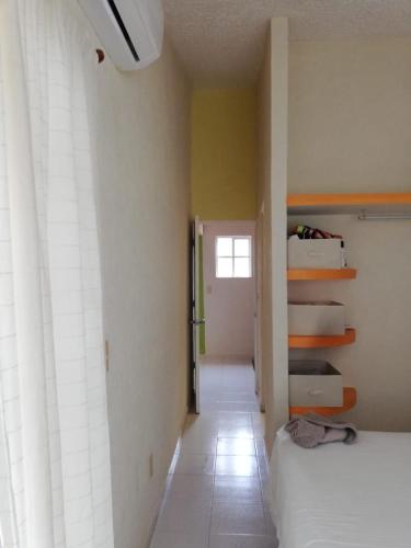 Postel nebo postele na pokoji v ubytování Joyas de Ixtapa... ¡El confort de tu Casa Ideal!