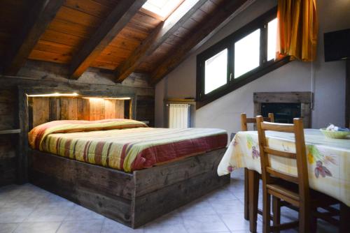 Voodi või voodid majutusasutuse Chalet Della Guida toas