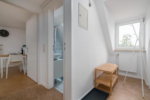 A seating area at CASSEL LOFTS - Gemütliches Apartment für 3 - Nähe Marienkrankenhaus