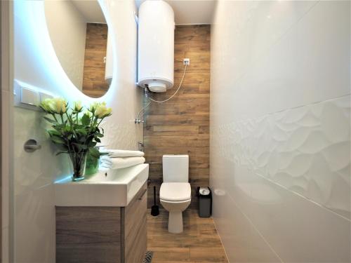 Ванная комната в VIP Apartamenty TYTUS