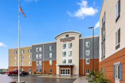 an image of an antriott hotel in a parking lot at Candlewood Suites - Fairbanks by IHG in Fairbanks