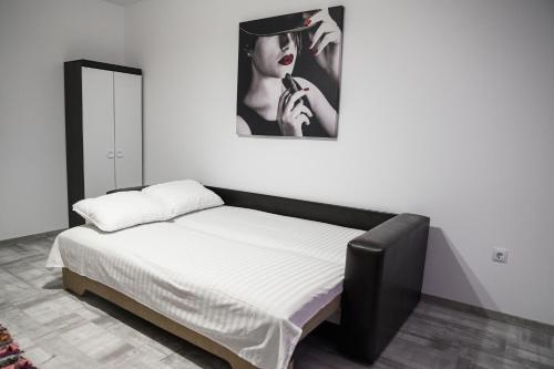 Cama ou camas em um quarto em Aparthotel Riana