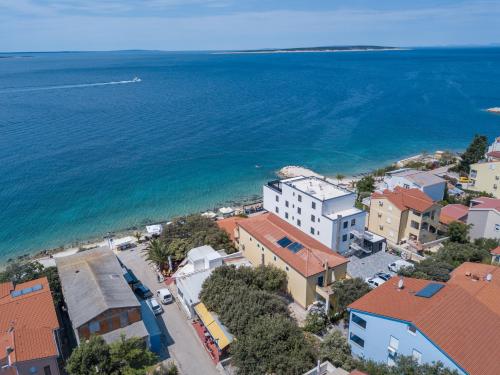 an aerial view of a city and the ocean at Apartmani Plazibat in Mandre