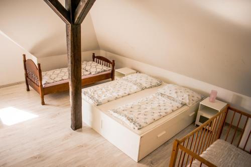 Un pat sau paturi într-o cameră la Ubytovanie V Súkromí Samuel