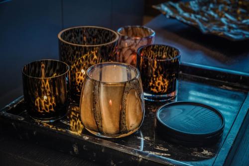 a group of glasses sitting on a tray at The 0507 A Luxury Flat in Antwerp in Antwerp