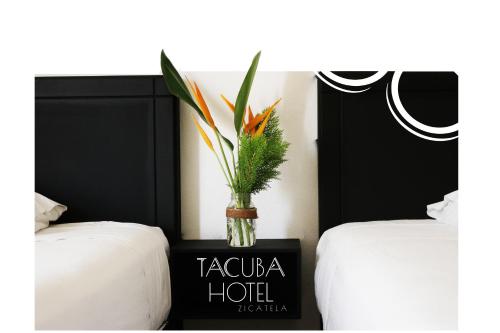 Ένα ή περισσότερα κρεβάτια σε δωμάτιο στο Casa Tacuba