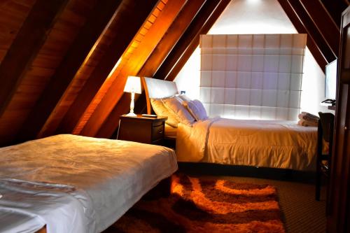 Postel nebo postele na pokoji v ubytování Casa Iris