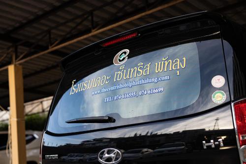 a bus windshield with a sign on the side of it at The Centris Hotel Phatthalung in Phatthalung