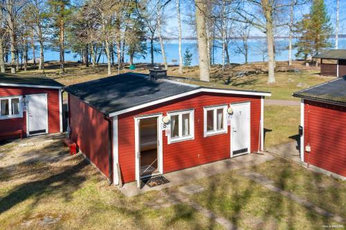 an aerial view of a red tiny house at First Camp Ekudden-Mariestad in Mariestad