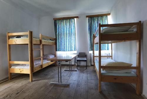 Postel nebo postele na pokoji v ubytování Kinderuni Bekokten
