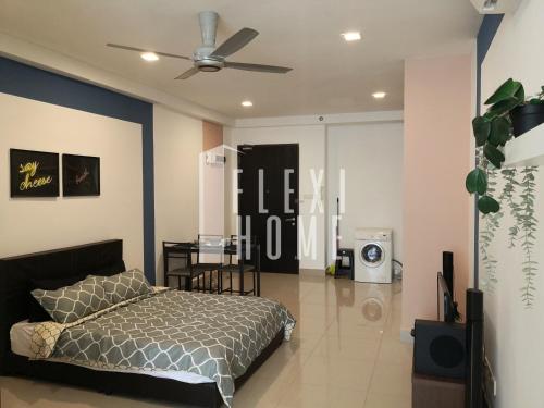 a bedroom with a bed and a ceiling fan at 9am-5pm, SAME DAY CHECK IN AND CHECK OUT, Work From Home, Shaftsbury-Cyberjaya, Comfy Home by Flexihome-MY in Cyberjaya
