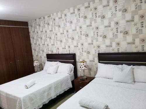 Cama o camas de una habitación en Tourist House