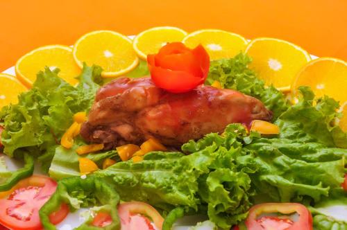 a plate of food with lettuce at New Kandy Residence in Kandy