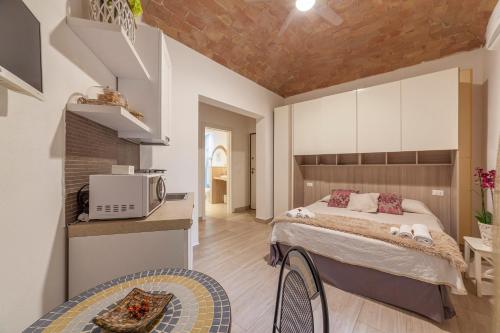 Katil atau katil-katil dalam bilik di B&B Prima Dell'Elba