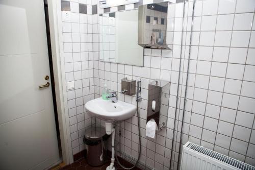 Koupelna v ubytování Apartments Puistokatu