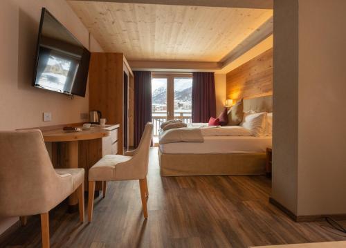 Ett rum på Mont Chalet Nevada - Hotel & Spa