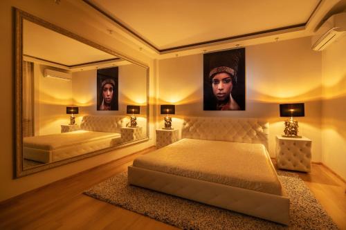 Ένα ή περισσότερα κρεβάτια σε δωμάτιο στο Premium Jacuzzi Apartment