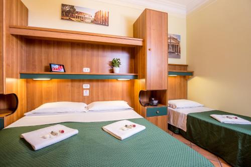 Katil atau katil-katil dalam bilik di Hotel Trastevere