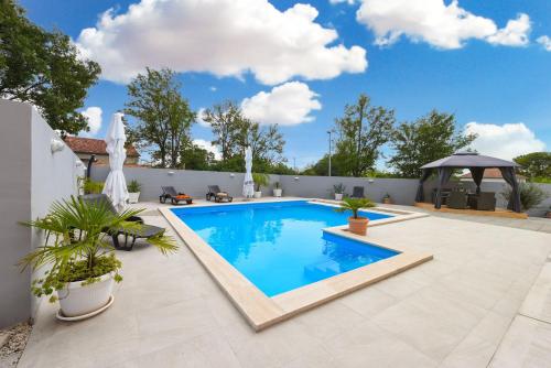 Πισίνα στο ή κοντά στο Villa Delmonicos ZadarVillas