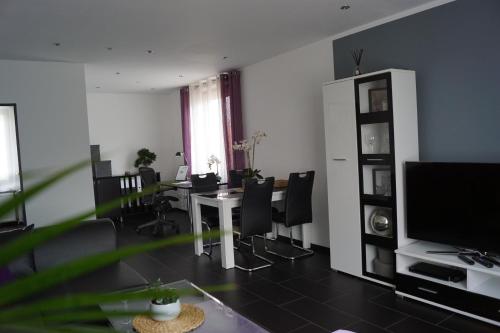 Televisyen dan/atau pusat hiburan di La Domus Superior Osnabrück Lotte