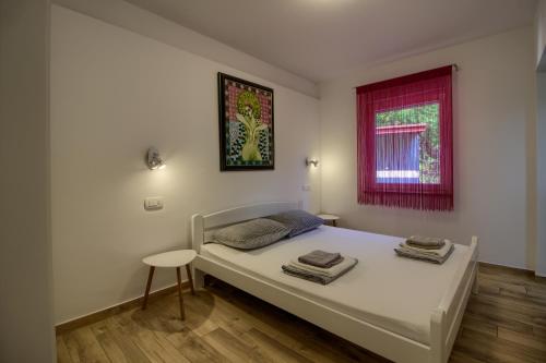 Posteľ alebo postele v izbe v ubytovaní Wonderful villa Nezakcij with pool near the town and the beach