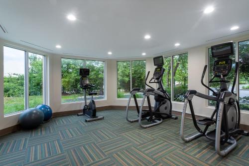 a fitness room with treadmills and exercise machines at Holiday Inn Express Hotel & Suites Philadelphia - King of Prussia by IHG in King of Prussia