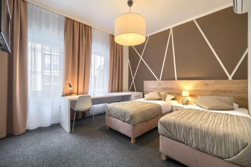 Posteľ alebo postele v izbe v ubytovaní Park Hotel Bydgoszcz