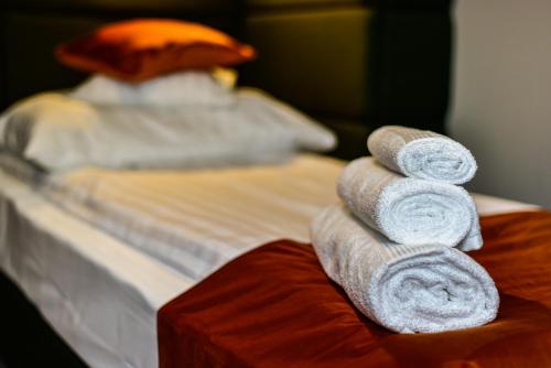Posteľ alebo postele v izbe v ubytovaní Candy Apartments Warszawa
