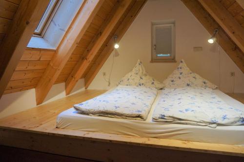 Postel nebo postele na pokoji v ubytování Weinhof Grosch