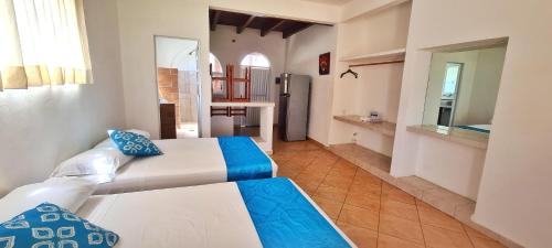 Postel nebo postele na pokoji v ubytování Bungalows Las Brisas Acapulco