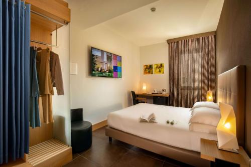 מיטה או מיטות בחדר ב-Best Western Plus Hotel Spring House