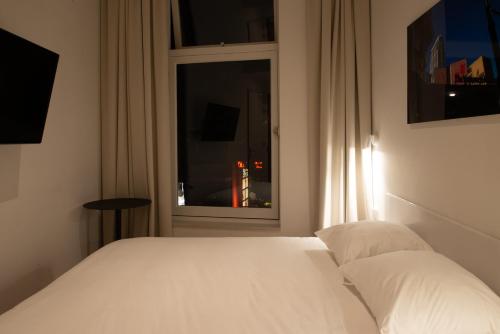 Postel nebo postele na pokoji v ubytování Hotel 171