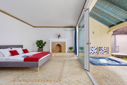 Giường trong phòng chung tại Villa Marina - A Slice of Paradise