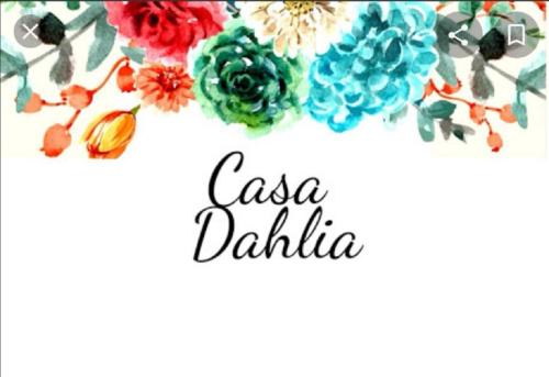 a watercolor flower banner with the words la dahlia at Casa Dahlia Querétaro in Querétaro
