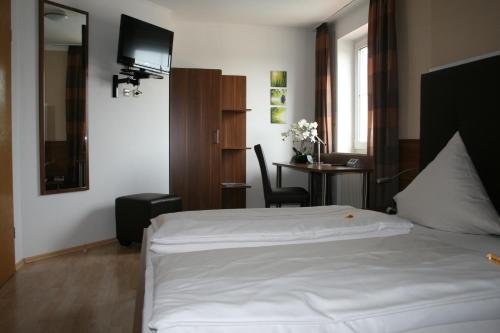 Cama o camas de una habitación en Hotel Bavaria