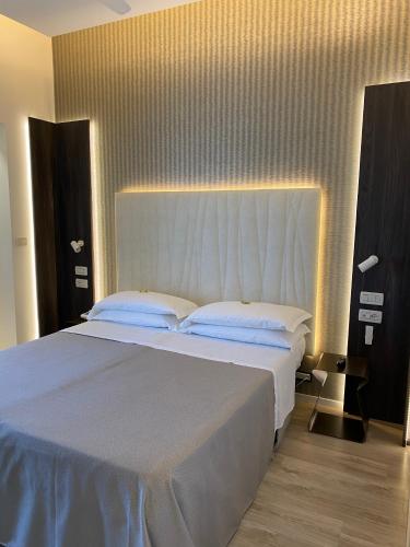 Katil atau katil-katil dalam bilik di Hotel Gardenia