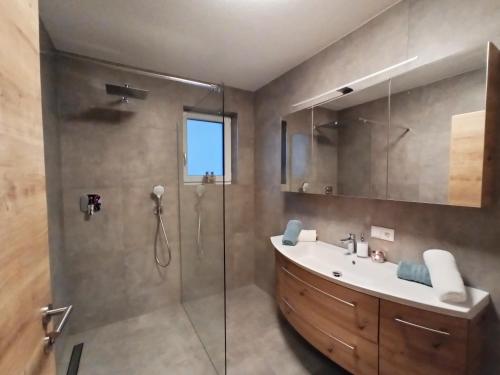 Kylpyhuone majoituspaikassa The AlpenHouse Gligic´s