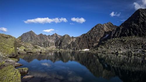 a view of a mountain lake in the mountains at The AlpenHouse Gligic´s in Sautens