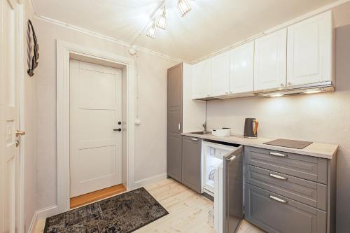 Tõnisson Apartmentsにあるキッチンまたは簡易キッチン