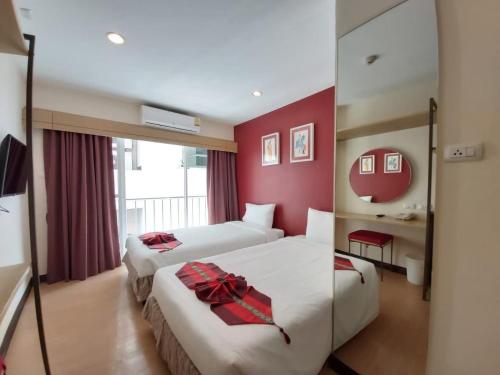 Postel nebo postele na pokoji v ubytování Klean Residence Hotel